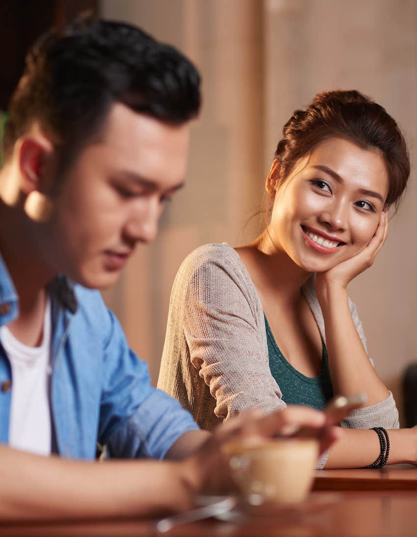 woman looking lovingly at man 